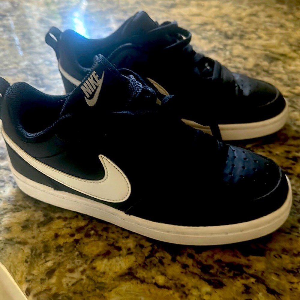 Nike dunks! Black and white. Never worn